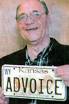 Picture holding ADVOICE license plate