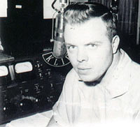 picture of Don Keyes in the KLIF control room, 1956